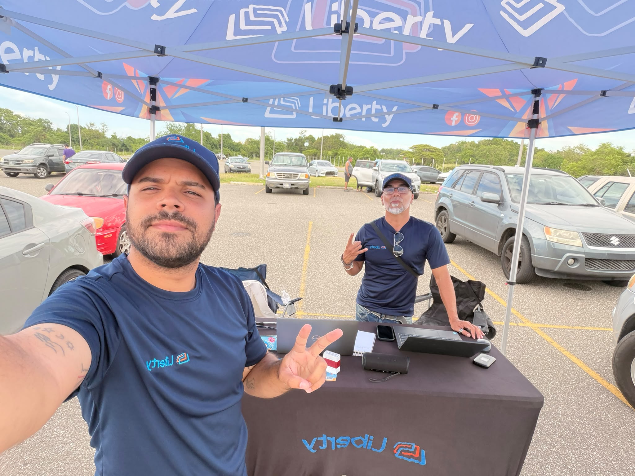 Sellers at a community event booth